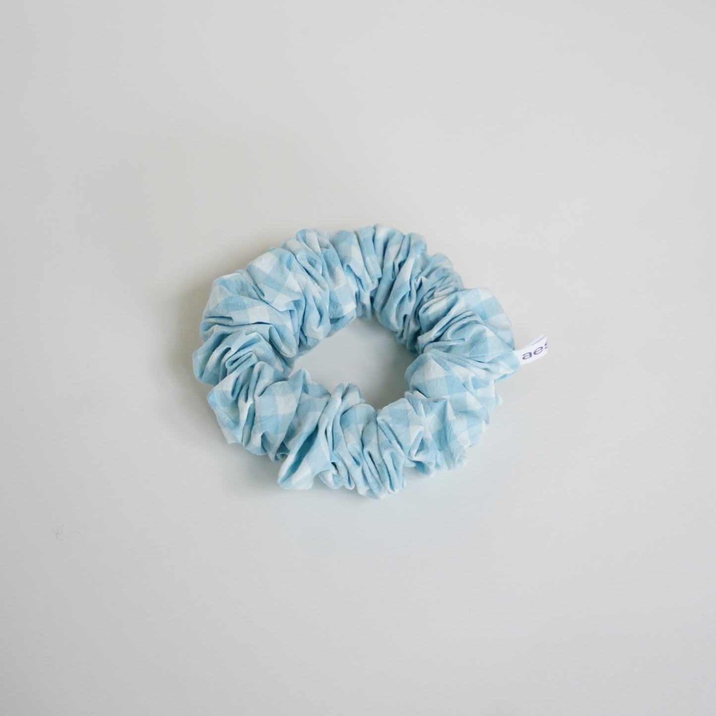 Chouchou pour tapis aesea - bleu